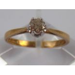 A 9 carat gold round brilliant cut diamond solitaire ring, estimated diamond weight approx 0.