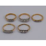 A mixed lot comprising five diamond rings, all circa 1910, all marked 18ct plat, sizes M-N,