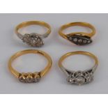 A mixed lot comprising four yellow metal (tests 18 carat gold) diamond rings, sizes H-N,