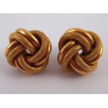 A pair of 9 carat gold knot earrings, approx 2cm wide, 4.6 gms.