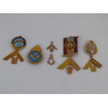 A fine collection of Masonic medals and charms comprising five 9 carat gold examples (gross weight