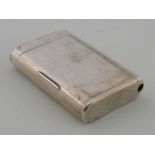 A Russian silver cigarette case with vesta compartment, slow match sleeve and box hinge.