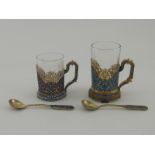 Two similar Russian silver-gilt and cloisonne enamel tea-glass holders by Gratchev Brothers with