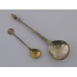 Two continental spoons, one Dutch late 19th. century with finial of St.