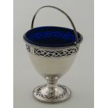 A George III pierced and engraved silver sugar bowl with beaded edge,