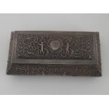 A large silver jewel box, the shaped sides and domed lid embossed with putti,
