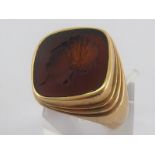 A gent's signet ring, marked 10k for 10 carat gold, ring size W, 12.3 gms.