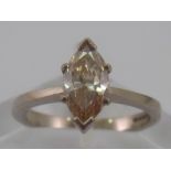 An 18 carat white gold diamond solitaire ring, the marquise shape diamond measuring approx 9 x 4.