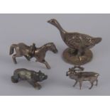 Four miniature white metal and silver animals, a stag, a pig, a goose and a horse.
