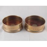 A pair of plain modern silver wine coasters by B. & Co.