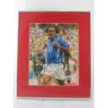 A signed photograph of Ronaldinho with Star Signings Ltd Certificate of Authenticity.