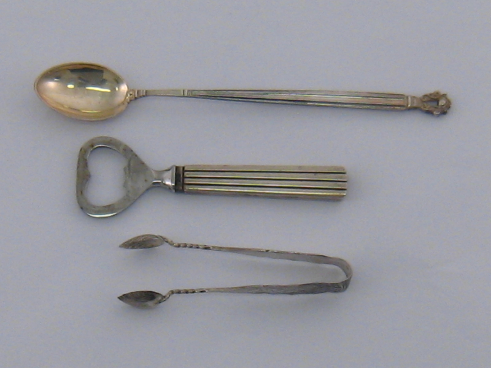 George Jensen. A Danish pickle spoon, Acorn pattern, length 18cm.