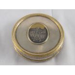 A Russian parcel gilt silver and niello snuff box with bead borders and set either side with oval