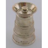 An Edwardian silver pepper mill shaped as a milk churn, Birmingham, 1906.