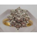 A diamond cluster ring, the brilliants totalling approx. 1.