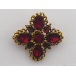 A Georgian garnet pendant/brooch, circa 1820,