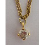 An 18 carat gold diamond solitaire pendant, the round brilliant cut diamond measuring approx. 4.