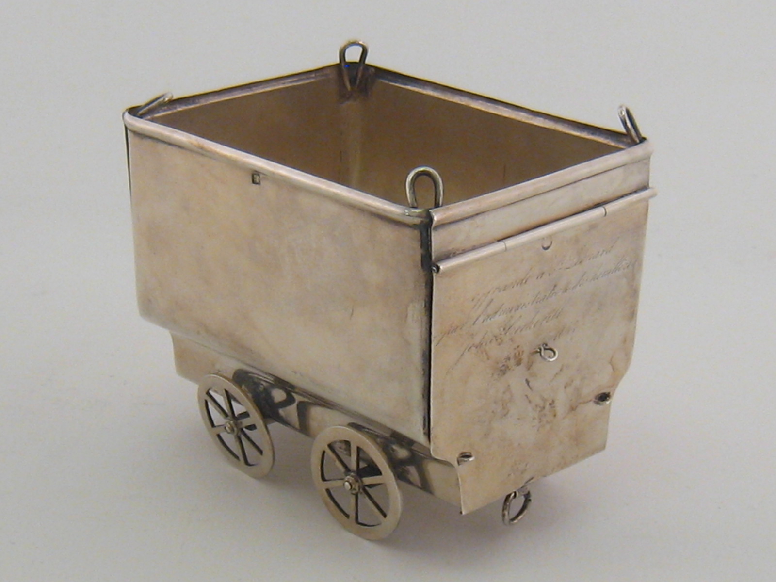 A Continental silver, Belgian 800 assay, model open top railway wagon with end discharge door,