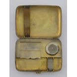 A plain combination silver cigarette case, sovereign case and vesta case,