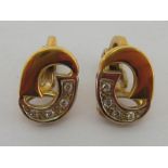 An 18 carat yellow gold and diamond clip earrings,