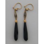 A pair of early 20th century 9 carat gold, onyx, garnet and seed pearl drop earrings,