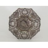 An octagonal cast silver, German 800 assay, pierced dish,