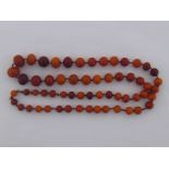 A graduated amber bead necklace, largest beads approx. 20mm, smallest approx. 10mm, necklace approx.