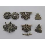 Three 19th century Russian silver and niello buckles, two with kindjal fasteners,