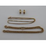 A mixed lot comprising two 9 carat gold chains and a pair of two colour 9 carat gold earrings,