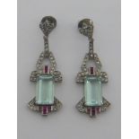 A pair of Art Deco aquamarine, diamond and ruby pendant earrings,