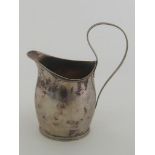 A Schleswig Holstein silver cream jug of bellied oval form by Berend Diedrich Ohmstedt, Altona,