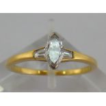 An 18 carat yellow gold and solitaire diamond ring, the marquise cut approx. .