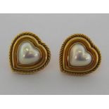 A pair of 18 carat yellow gold and cultured pearl earrings, each heart shaped pearl 2.