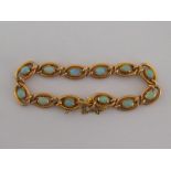 A Victorian 15 carat gold and opal bracelet,