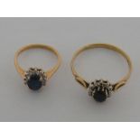 Two sapphire and diamond cluster rings, the first with a 7.4mm x 5.