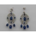 A pair of sapphire and diamond pendant earrings,