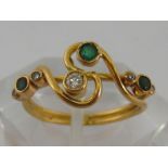 An Italian 18 carat yellow gold, diamond and emerald ring, finger size M, 2.