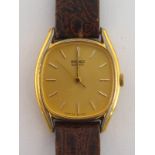 SEIKO, a lady's gilt metal quartz wrist watch, with gilt dial and baton detail, 23mm width,