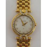 BUCHERER, a lady's 18 carat gold and diamond quartz wristwatch,