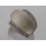 A rock crystal and diamond bombe ring,