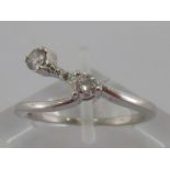 A 14 carat gold and two stone diamond ring, the two brilliants totalling approx. 0.