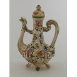 A ceramic ewer with bird neck spout and decorated with flowers.