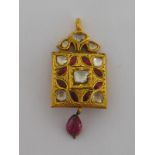 A gold and multigem pendant,