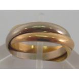 CARTIER, a three colour 18 carat gold 'Trinity' ring, fully hallmarked and signed, number U00621,