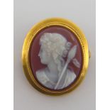 A yellow metal (tests 18 carat gold) hardstone cameo brooch, approx 33 x 26mm, 9.