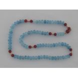 An aquamarine and carnelian bead necklace,