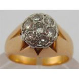 A yellow metal (tests 18 carat gold) round brilliant cut diamond ring, estimated total diamond