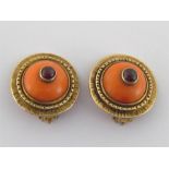 A pair of silver gilt, coral and garnet boss earrings, the domed coral 57mm diameter, 20.4gms