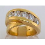 An 18 carat gold and diamond ring, the large tension set brilliants totalling approx 1.7 carats, the