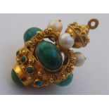 An 18 carat gold, turquoise and cultured pearl pendant, modelled in the round as a coronet, the
